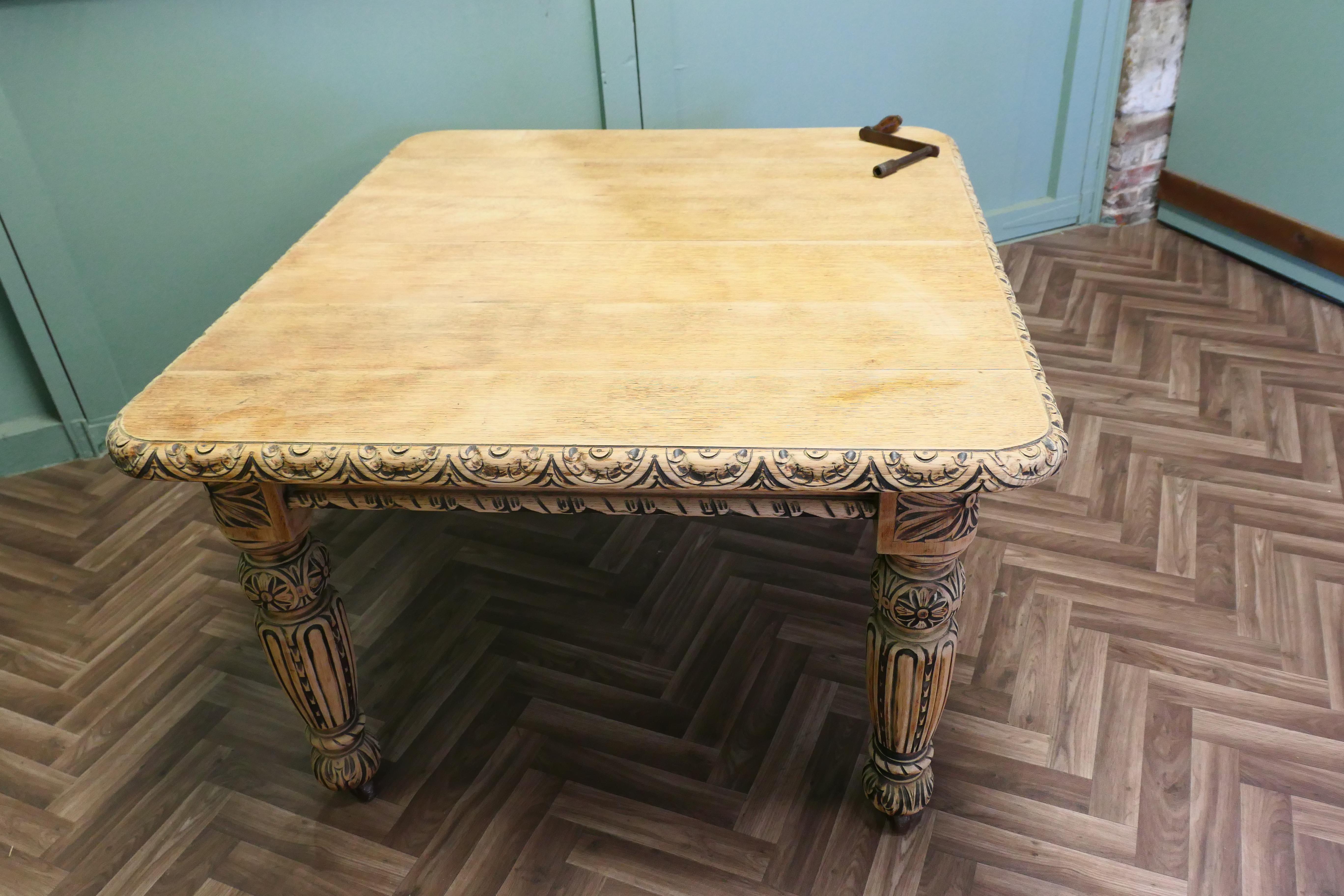 Bleached Oak Gothic Style Extending Dining Table This is a very sturdy table In Good Condition For Sale In Godshill, Isle of Wight