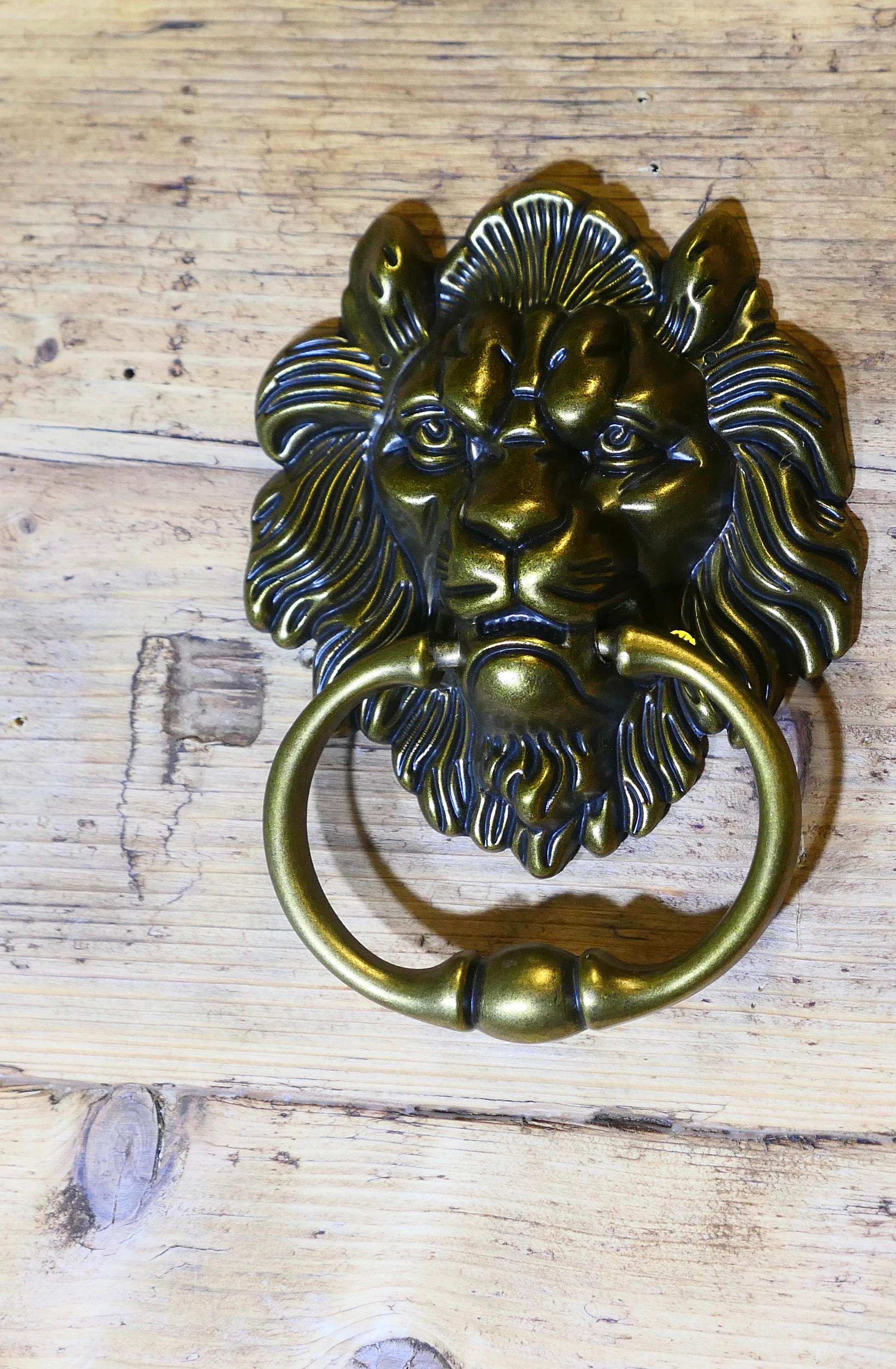 Gothic Revival Gothic Lion’s Mask Brass Door Knocker   This is a good looking door knocker For Sale