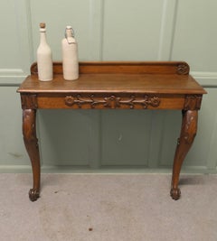 Carved Oak Console or Hall Table This is an attractive piece