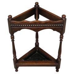 A Turned Oak Corner Stick and Umbrella Stand This is a very unusual piece