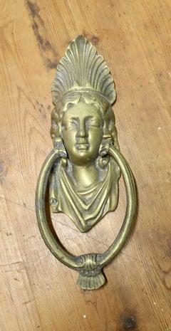 A Victorian Brass Caryatid Door Knocker A Large Victorian Brass door knocker