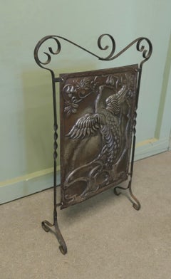 Arts and Crafts Peacock Design Polished Iron Fire Screen This is a Classic in t