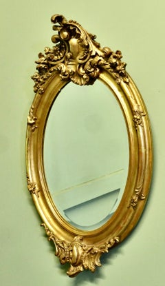 Classic Large French Rococo Oval Gilt Wall Mirror The Mirror is exquisite