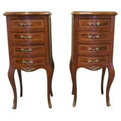 A Pair of Tall French Four Drawer Ormolu Side Lockers These are wonderful