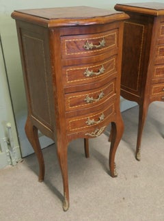 A Pair of Tall French Four Drawer Ormolu Side Lockers These are wonderful