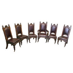 A Set of 6 Gothic Oak High Back Carved Dining Chairs This is a superb set