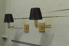 A Pair of Brass Swing Arm Wall Lights Great pieces for any room