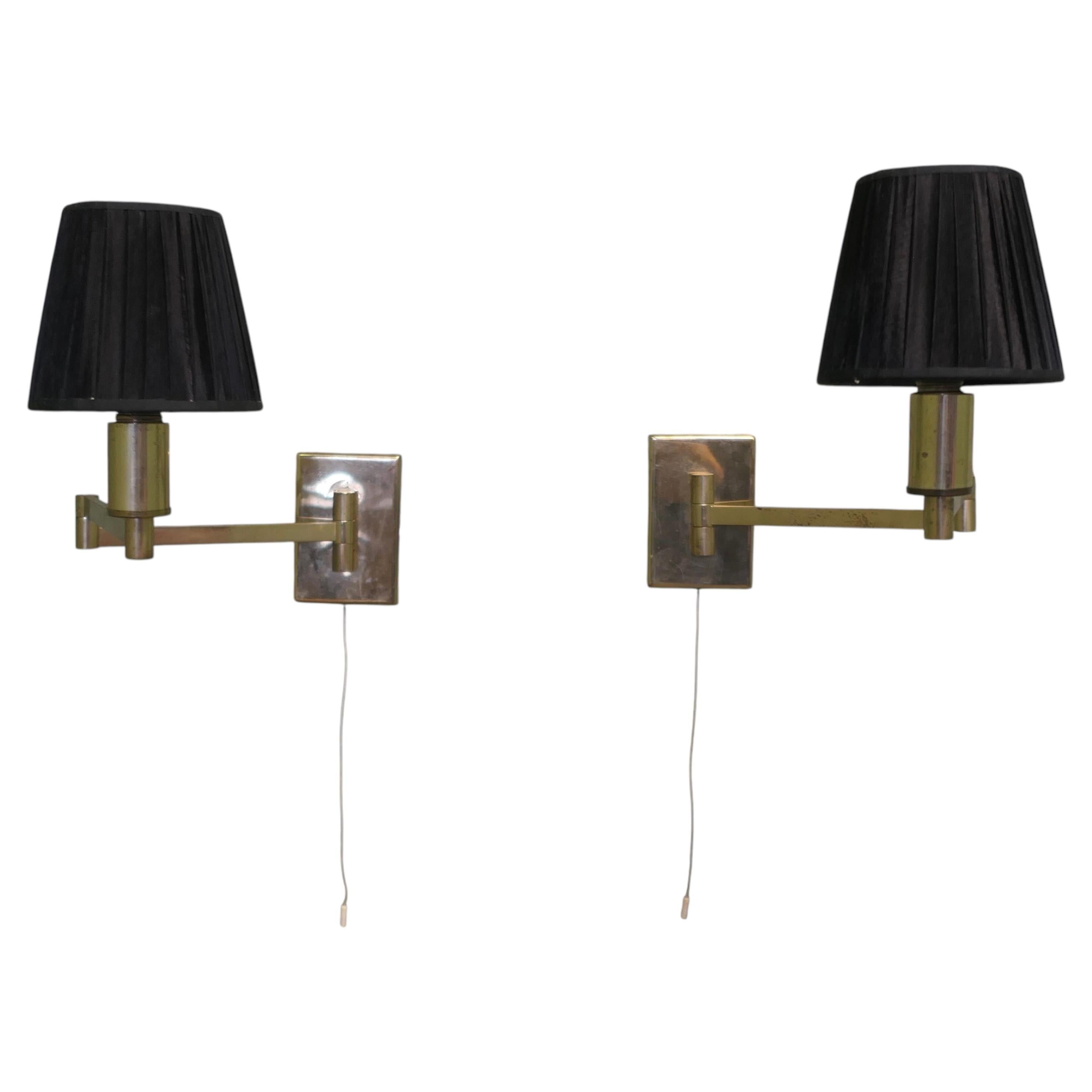 A Pair of Brass Swing Arm Wall Lights Great pieces for any room For Sale