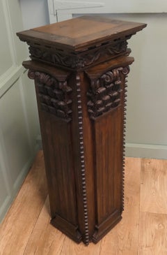 French Carved Oak Column Display Pedestal The pedestal is square in shape