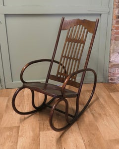 Fauteuil à bascule « Secessionist » en bois courbé, attribué à Jacob et Josef Kohn.