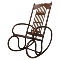 Fauteuil à bascule « Secessionist » en bois courbé, attribué à Jacob et Josef Kohn.