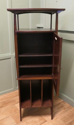 Arts and Crafts Scottish Music Cabinet by Harvey Ellis.
