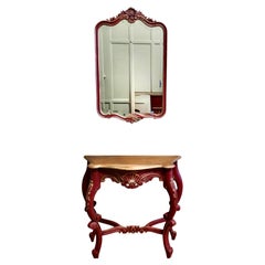 Ensemble composé d'une console ou d'une table d'entrée française et d'un miroir assorti. Il s'agit d'un ensemble très séduisant