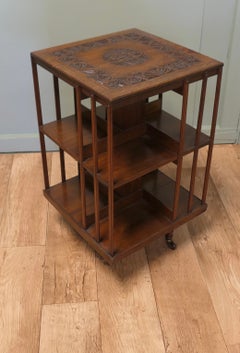 A Carved 2 Shelf Revolving Oak Bookcase The Bookcase is excellent Quality it h