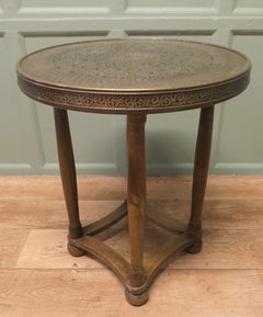 Arts and Crafts Brass Top Table, Peacock This piece is being offered from a dis