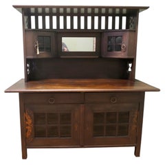 Arts & Crafts Oak Sideboard by Leonard Wyburd for Liberty & Co.