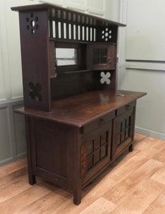 Arts & Crafts Oak Sideboard by Leonard Wyburd for Liberty & Co.