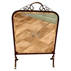 A Fine Quality Art Deco Brass and Sunburst Mirror Fire Screen This is a decorat