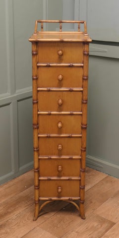 Simulated Bamboo 7day Chest of Drawers by Harrods A late 20th Century good quali