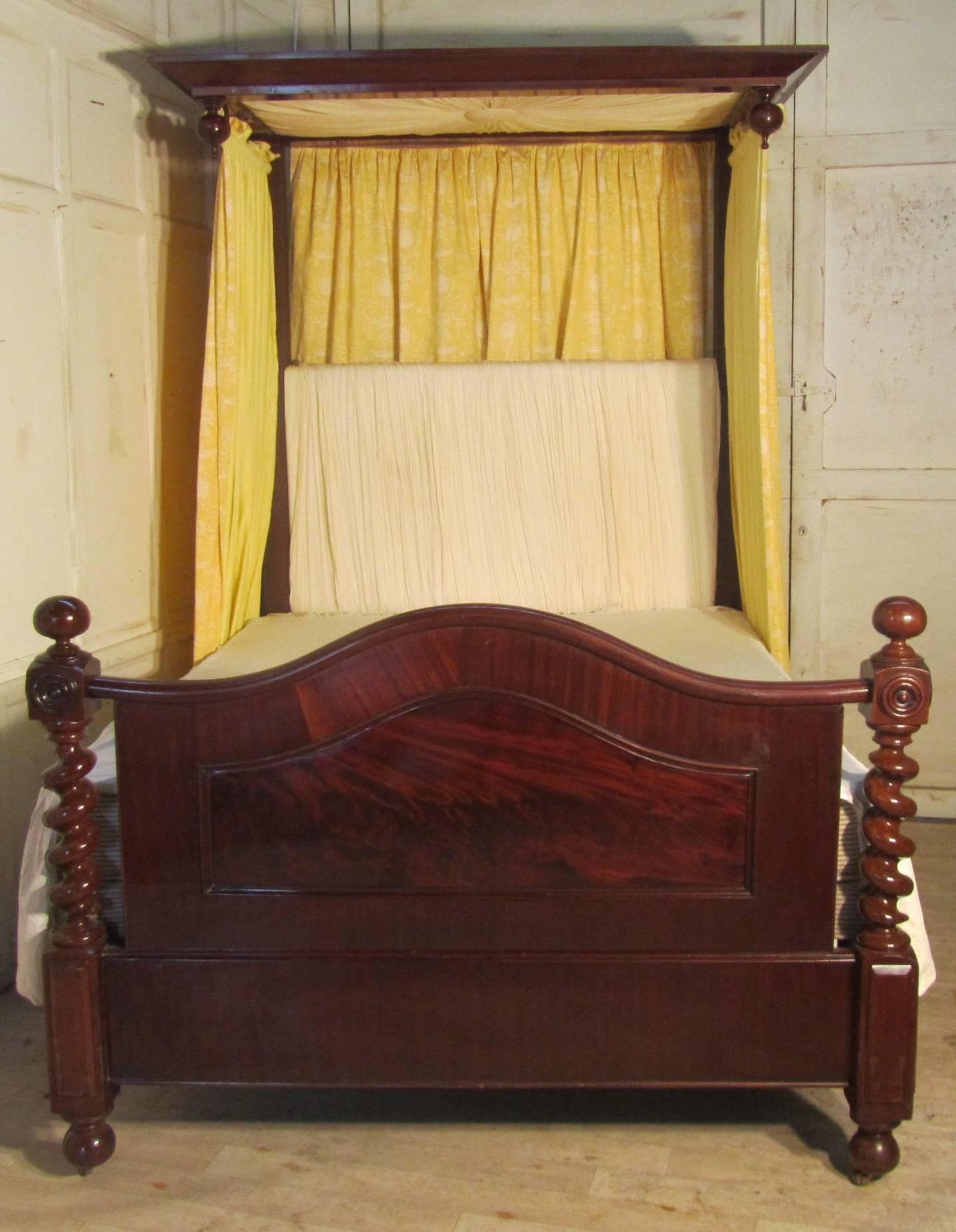 This Victorian mahogany half tester bed is superb, it dates from around 1860 it has a half canopy over the head end, this has a sunburst fabric panel inset, with large hanging teardrop turnings to the front.

The foot board of the bed is made in