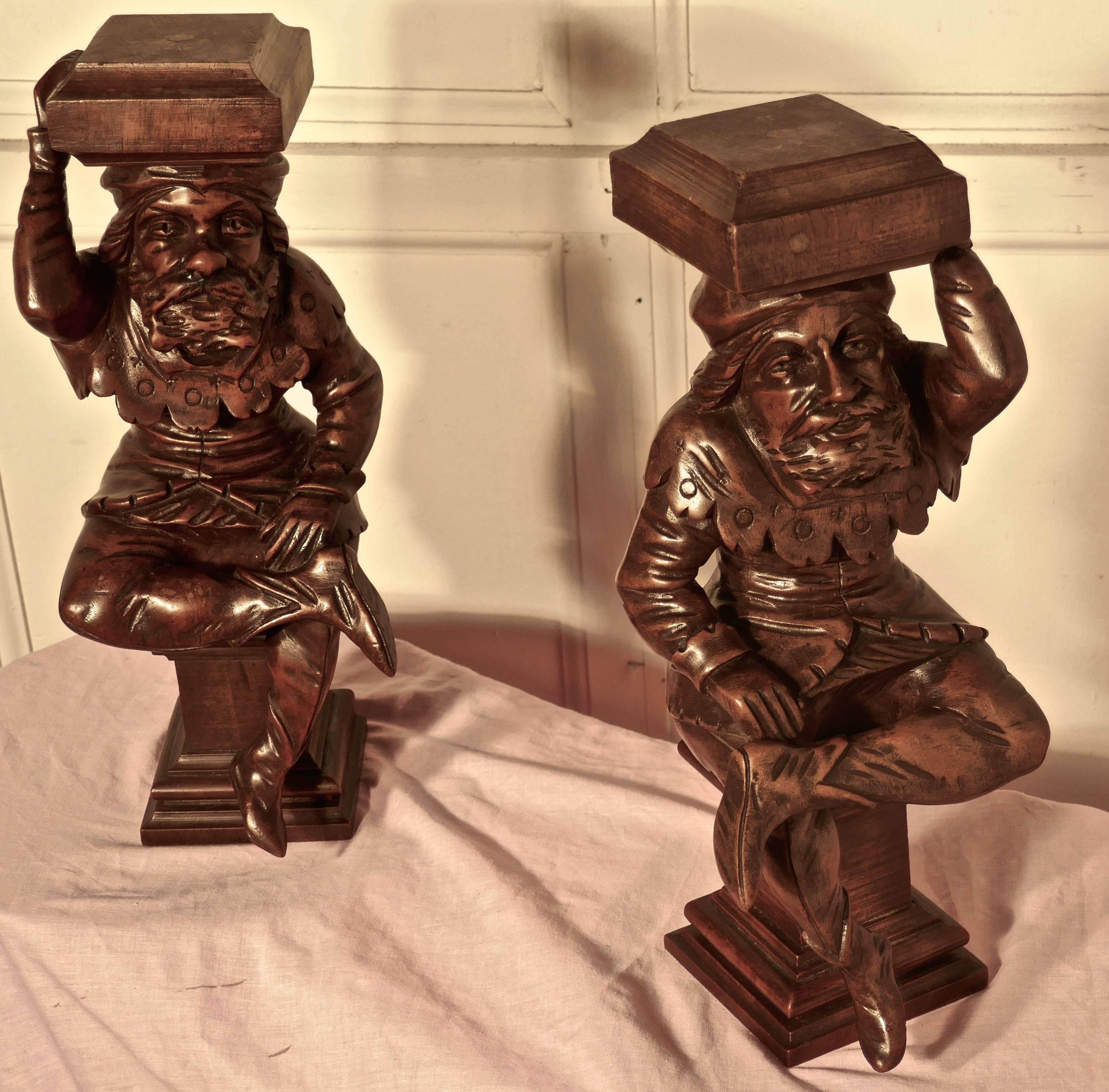 A very fine pair of early 19th century carved figures, of Court Jesters

These bearded gentlemen have been superbly carved in the finest detail, they original came from a piece of early 19th Century Furniture
Both the characters have finely detailed