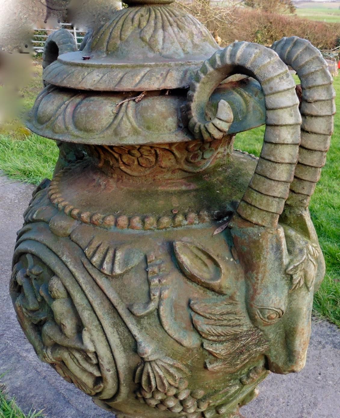 This large and imposing cast iron urn probably came from a Victorian Cemetery, it has been cherished in a London Garden for over 70 years, no wonder when you can see the superb patina of the piece
The urn has survived with its pineapple topped lid,