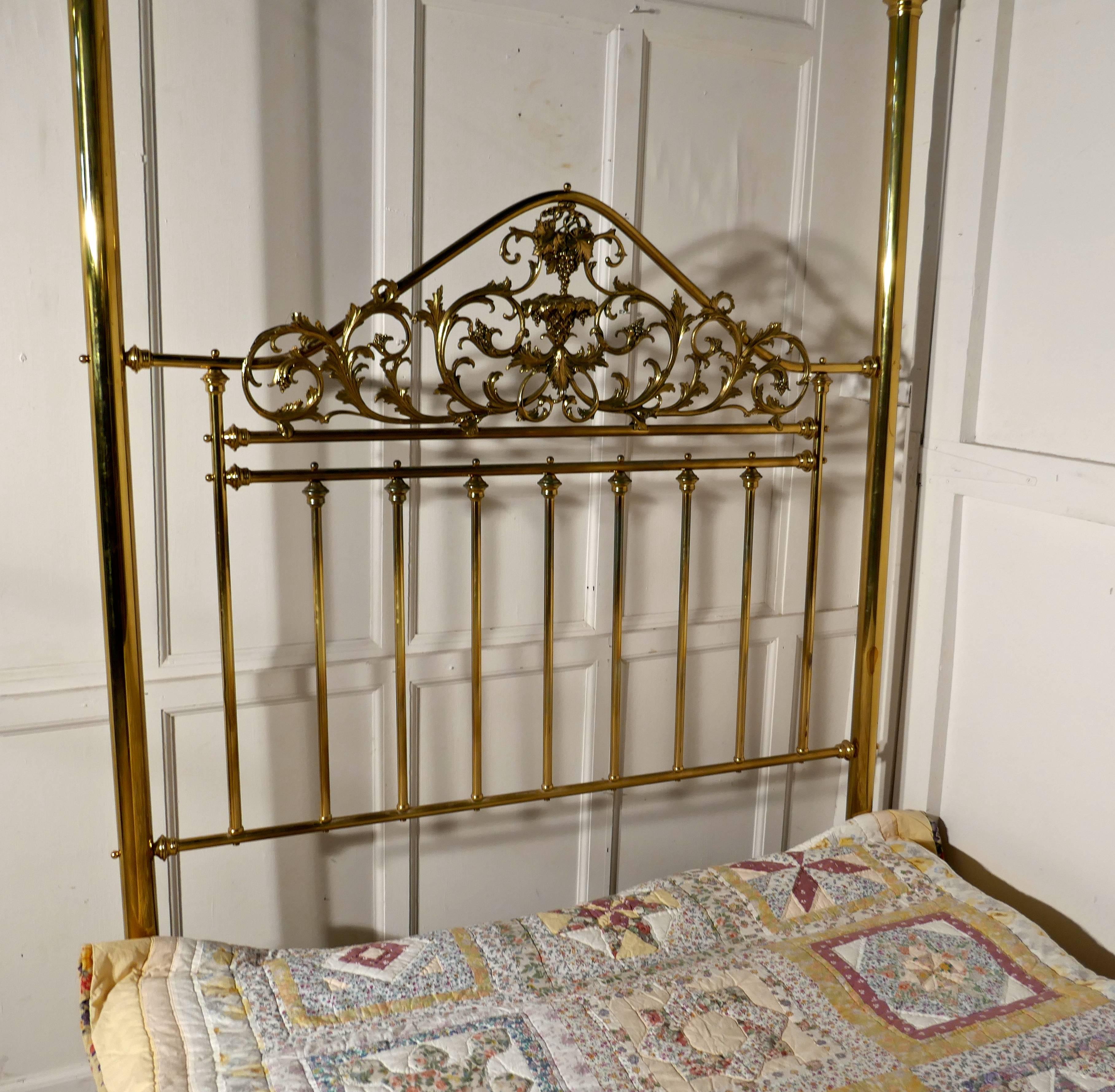 This very pretty Victorian bed it dates, circa 1880 it is has a charming brass head board, the Art Nouveau central panel is decorated with grapes and vines all made and cast in solid brass, on either side of this there are tall posts at each side
