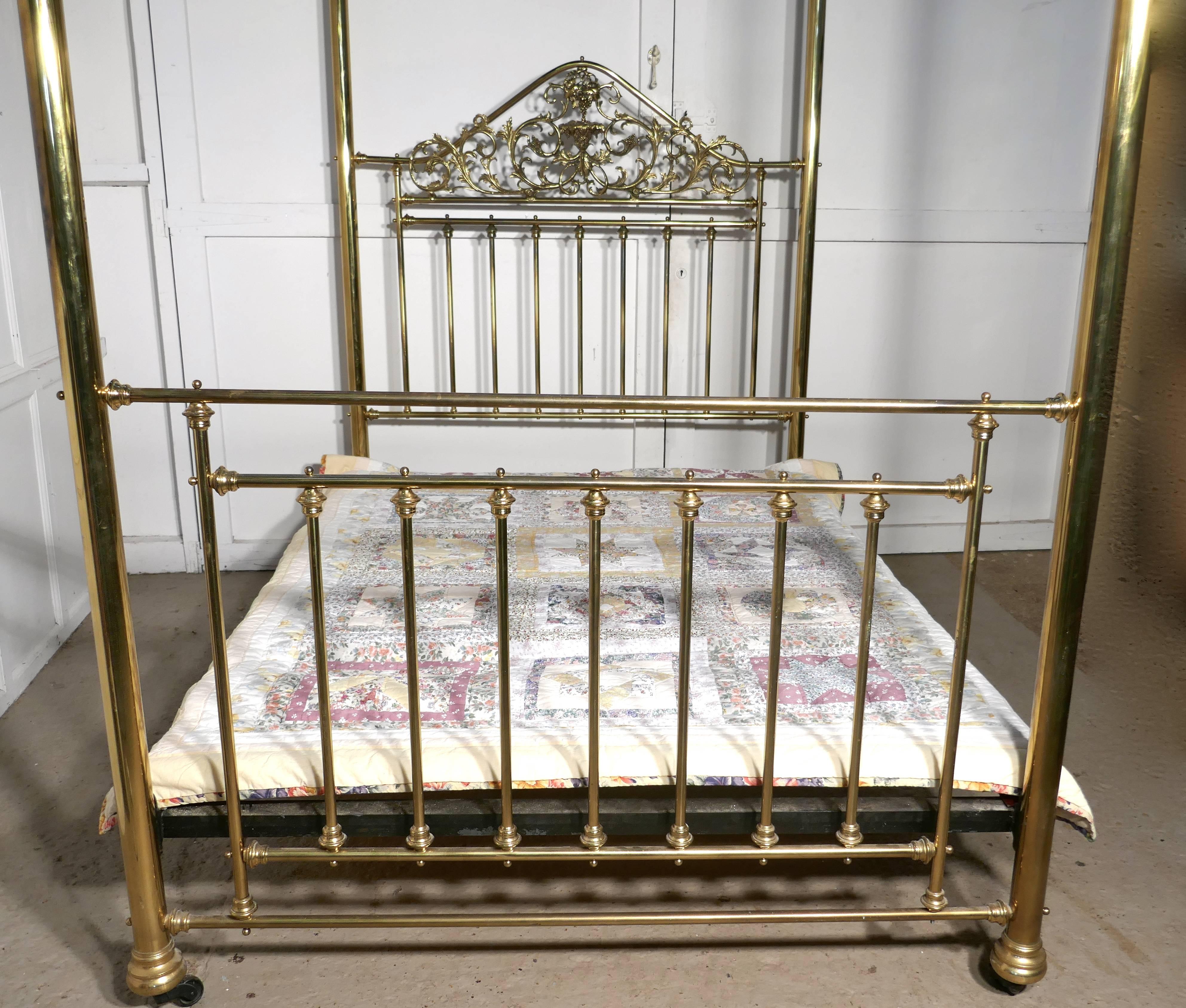 brass four poster bed