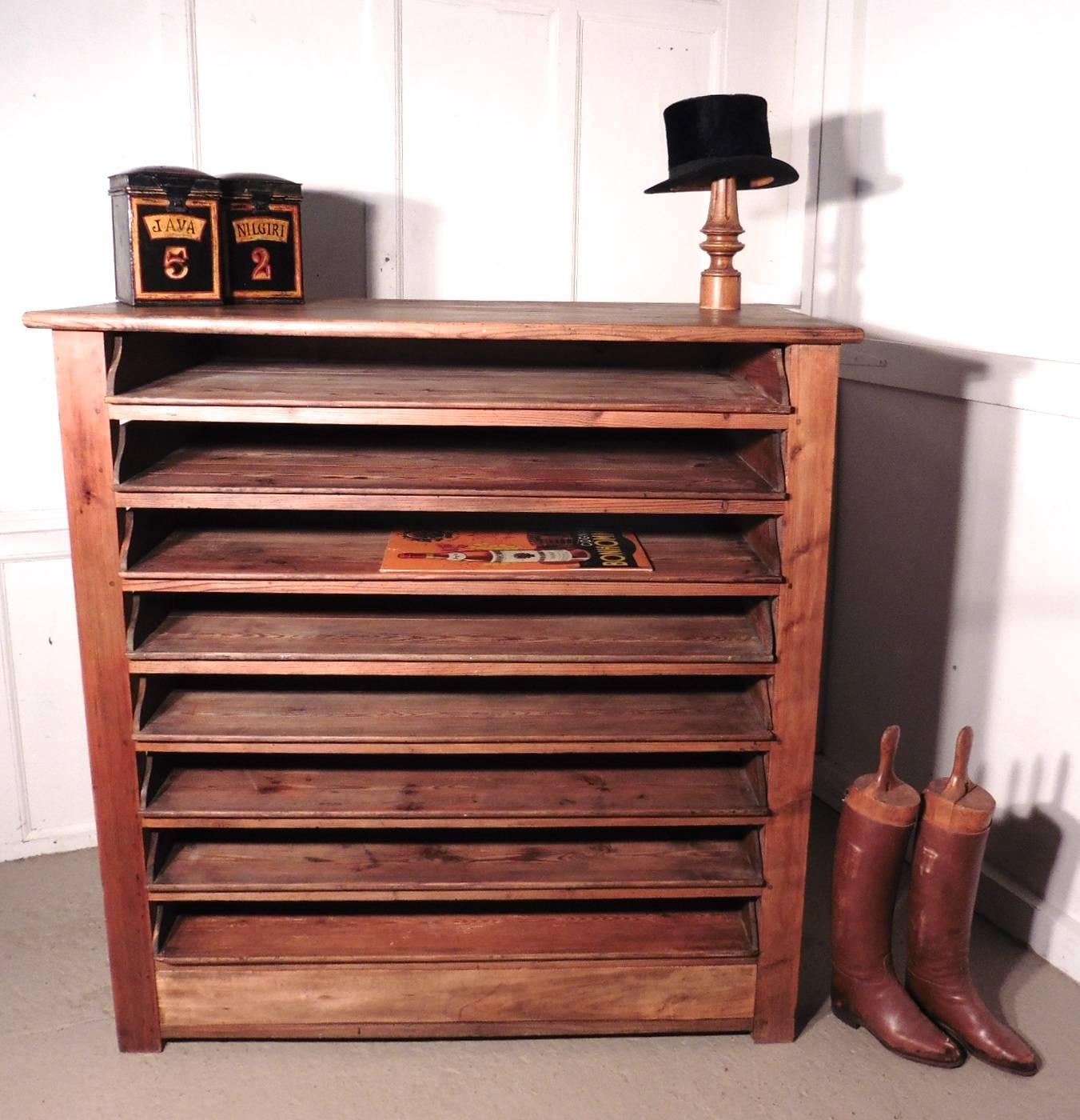 This piece came from an artists studio in France, it has eight large sliding trays or drawers, it is open at the sides and the from which makes it easy to see the contents so it would work well as a shop display piece 
The chest is made in rustic