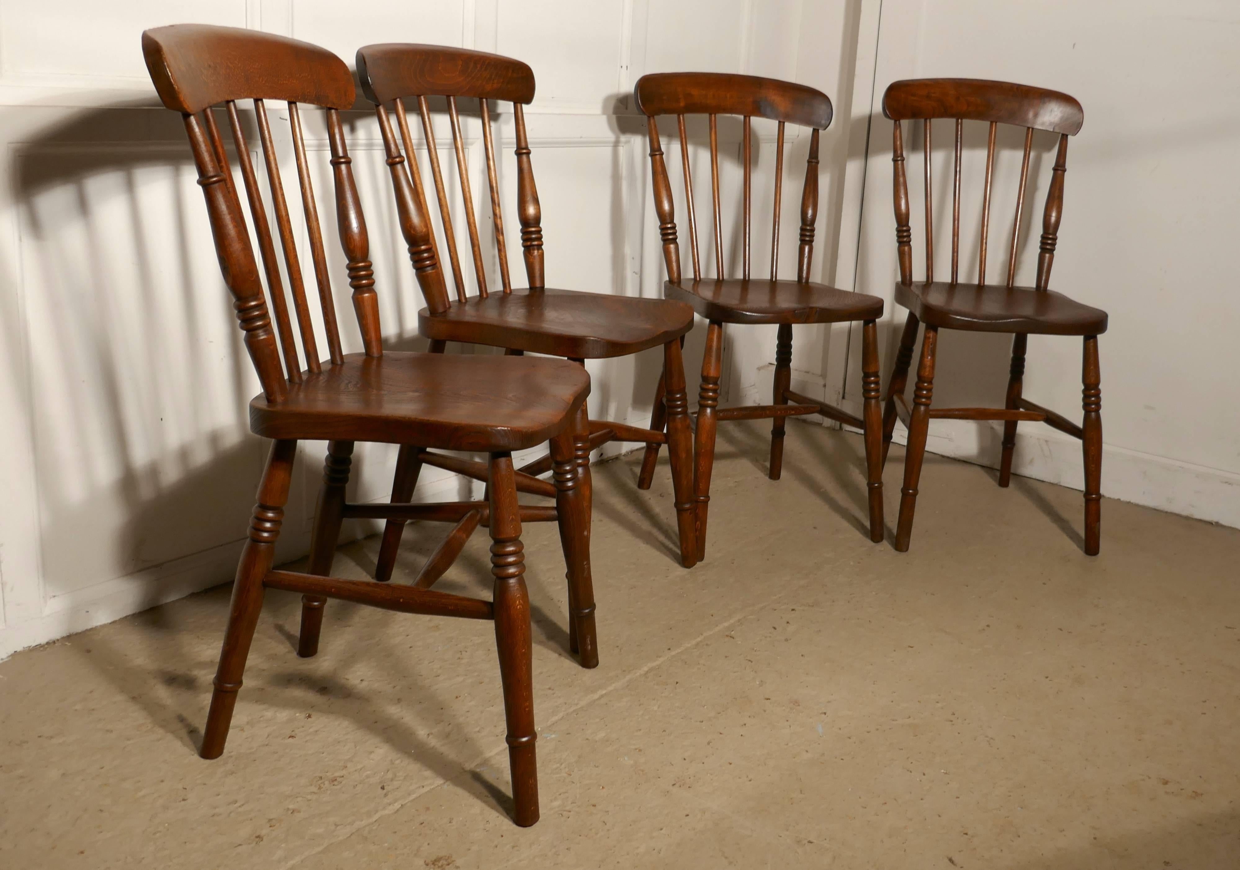 English Set of Four Victorian Elm Seated Stick Back Windsor Kitchen Dining Chairs