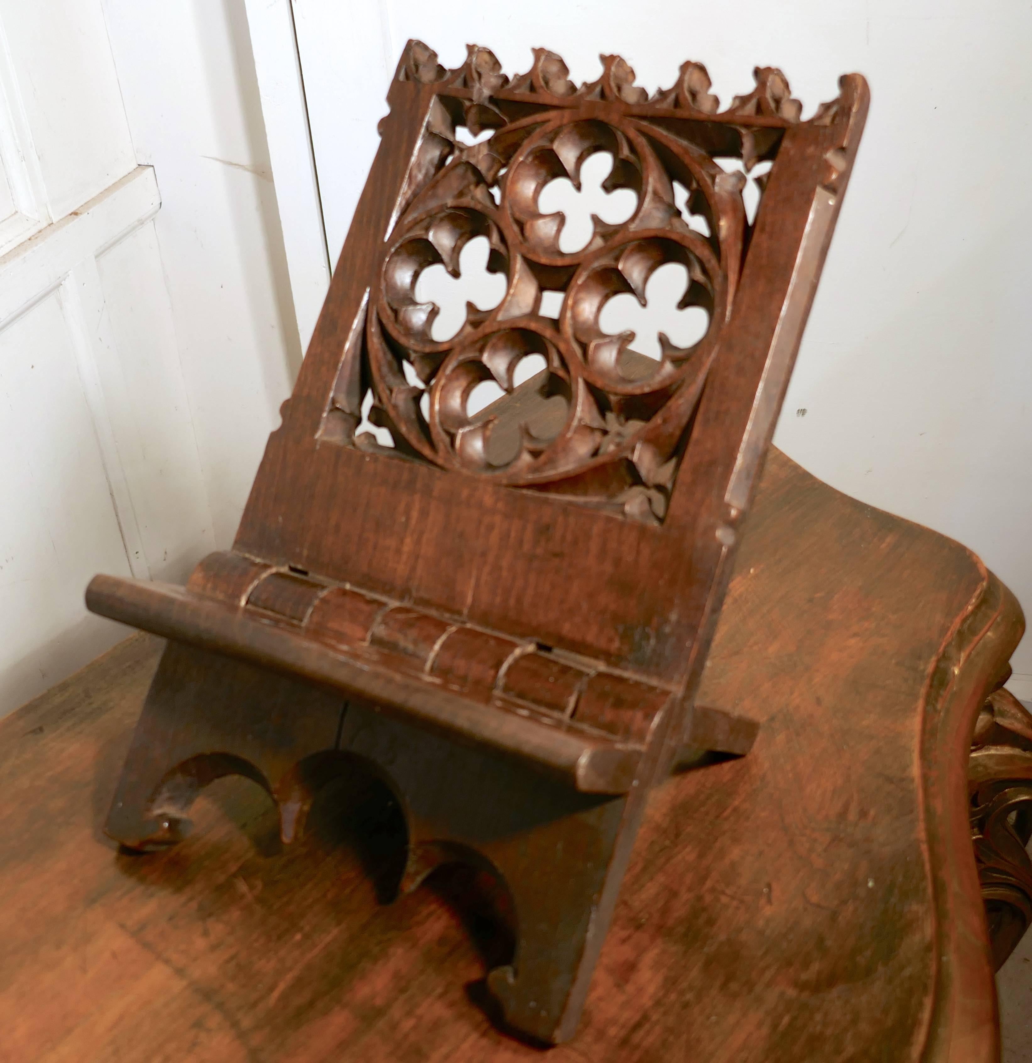 The stand is carved in solid oak with the shapes of Gothic roses, I was told that it originated from a presbytery in France,
This is a charming piece, it is made from one piece of Oak and dates from the mid-19th century, it has been superbly and