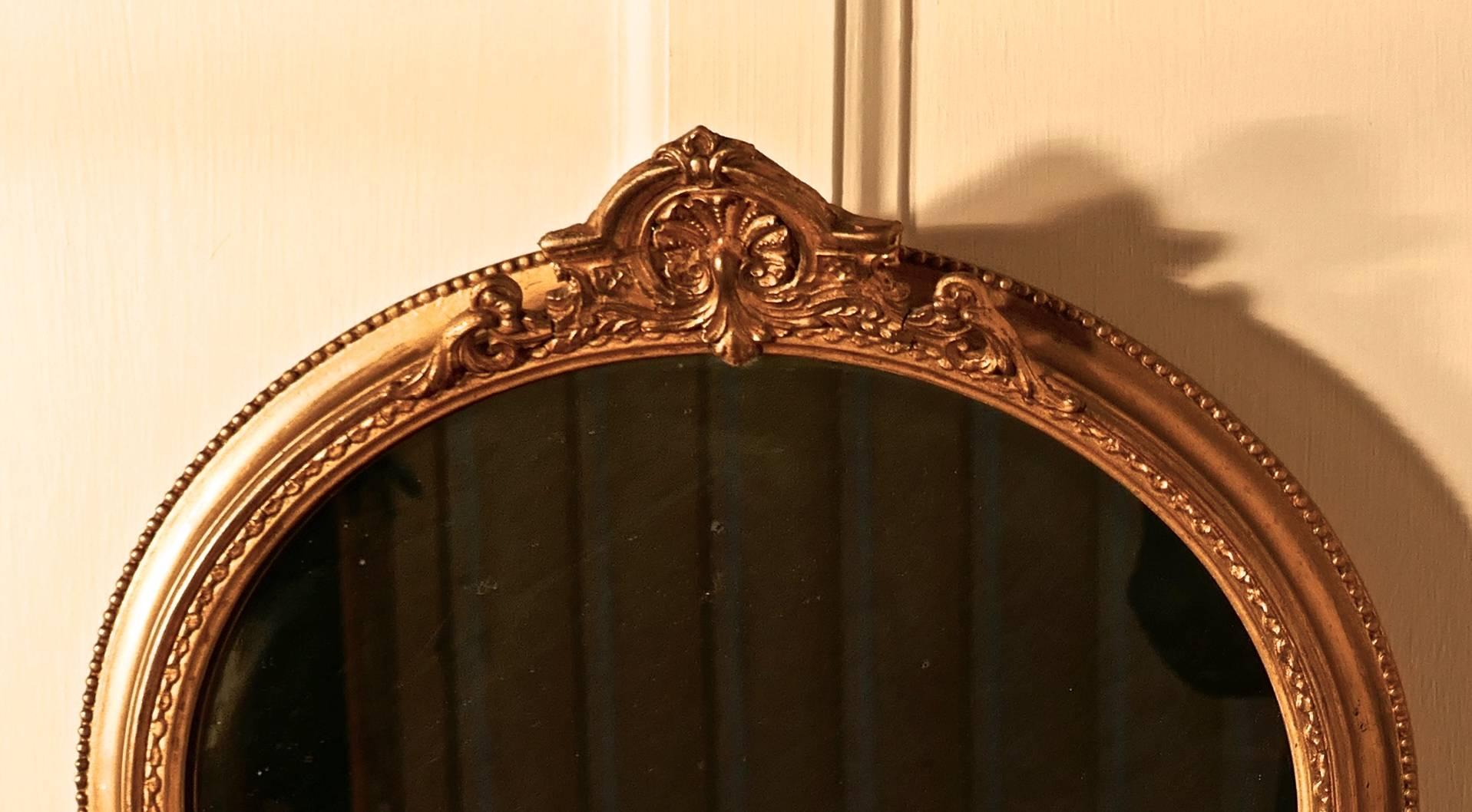 George III Rare paire de miroirs ovales dorés de style Régence du 19ème siècle en vente