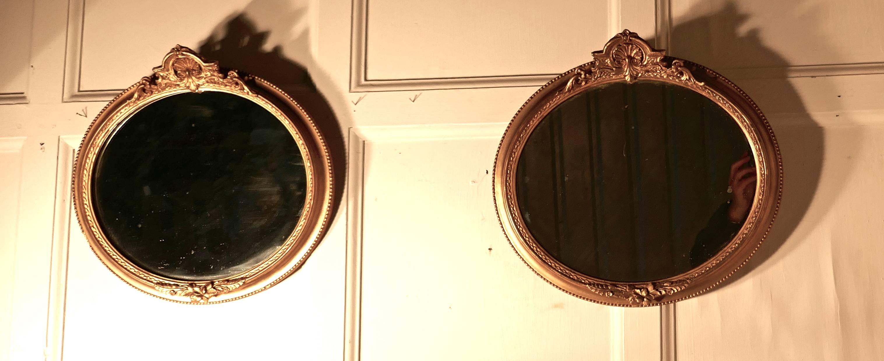 Rare Pair of 19th Century Regency Style Oval Gilt Mirrors In Good Condition For Sale In Chillerton, Isle of Wight