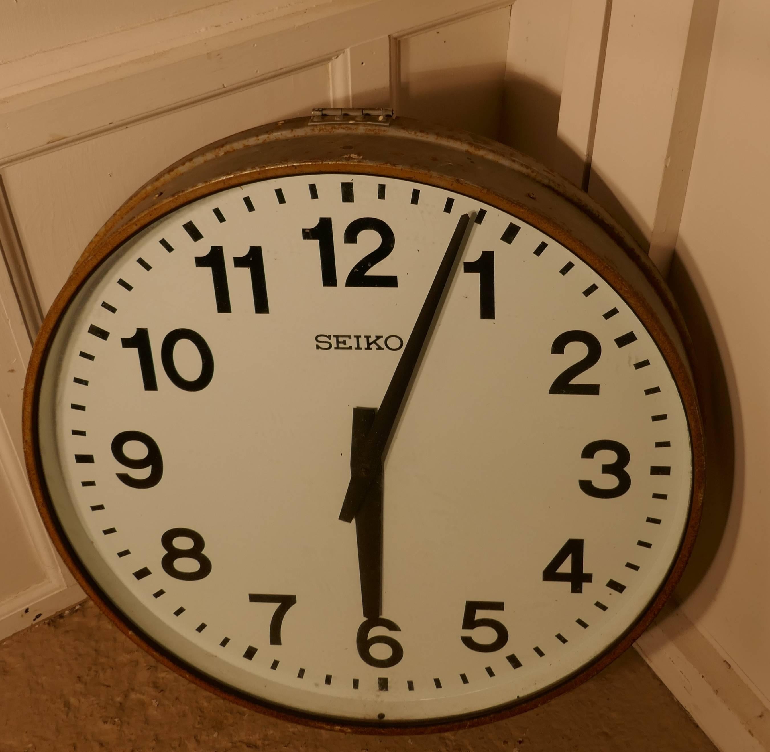 large industrial wall clock