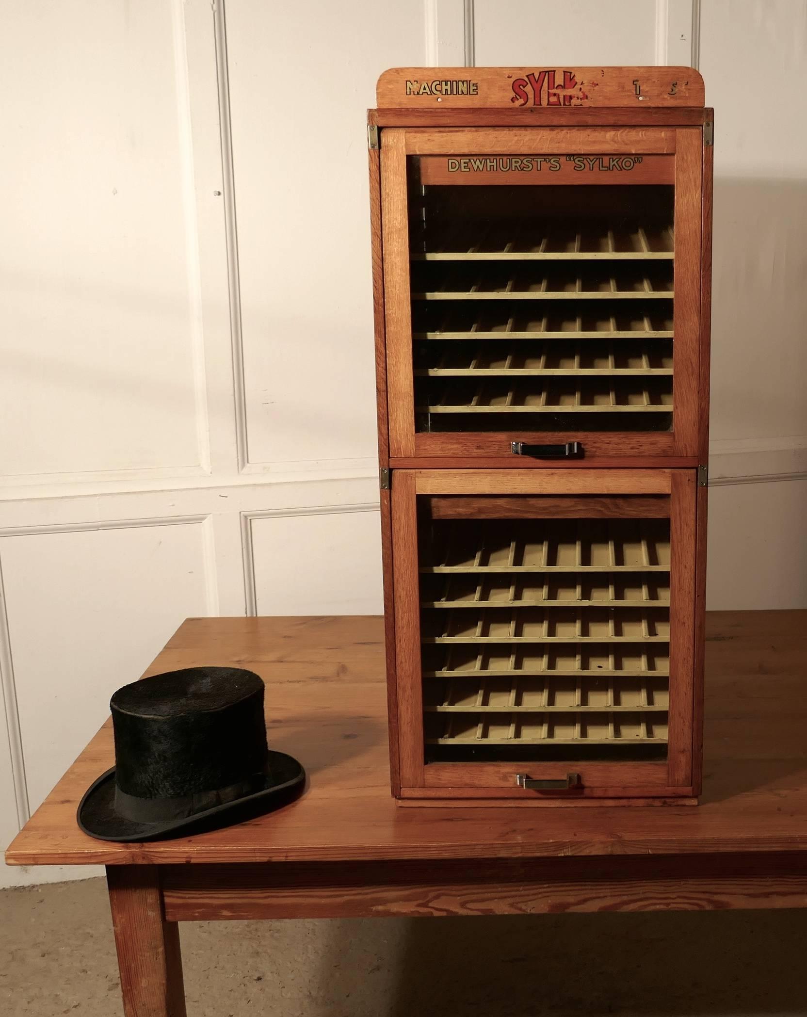 This is a rare and larger than usual Sylko cotton reel cabinet, this cabinet has two glass lift up doors to the front of the cabinet as well as a full length back door, the handles and fittings re in chrome
The cabinet would have been in everyday