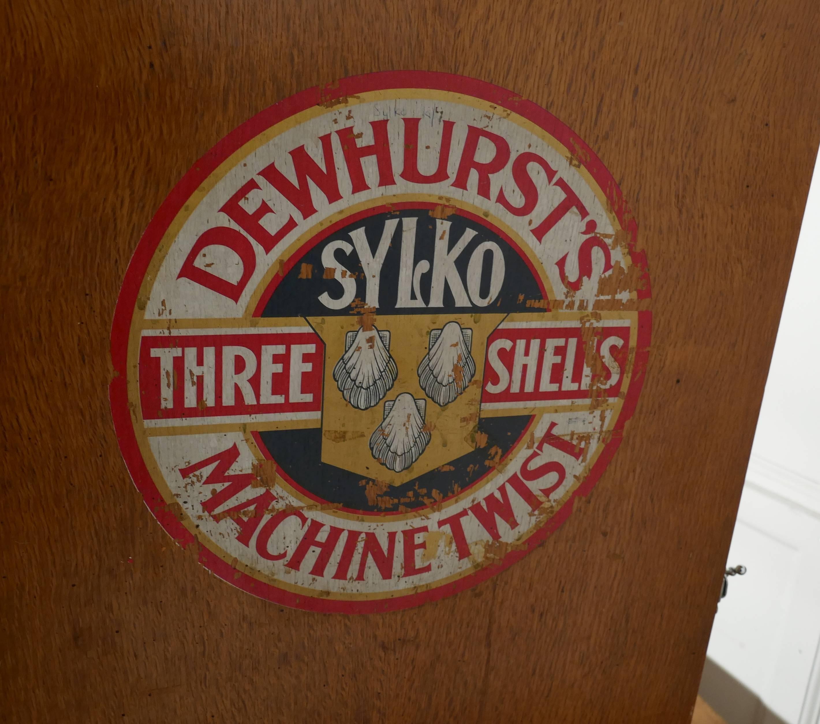 Tall Two-Door Sylko Haberdashery Advertising Cabinet 1