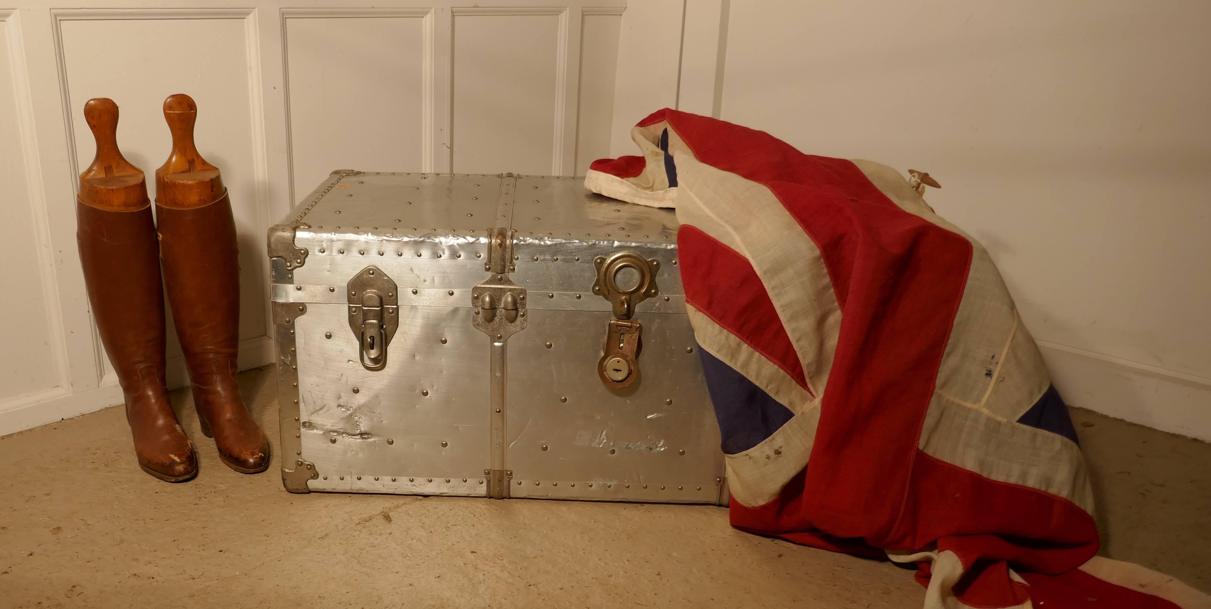 A super piece, dating back to the time of early passenger flights in the 1930s, the trunk is studded and bound and has strong leather handles
The catches work well but we do not have a key to operate the main lock in the centre, the trunk is lined