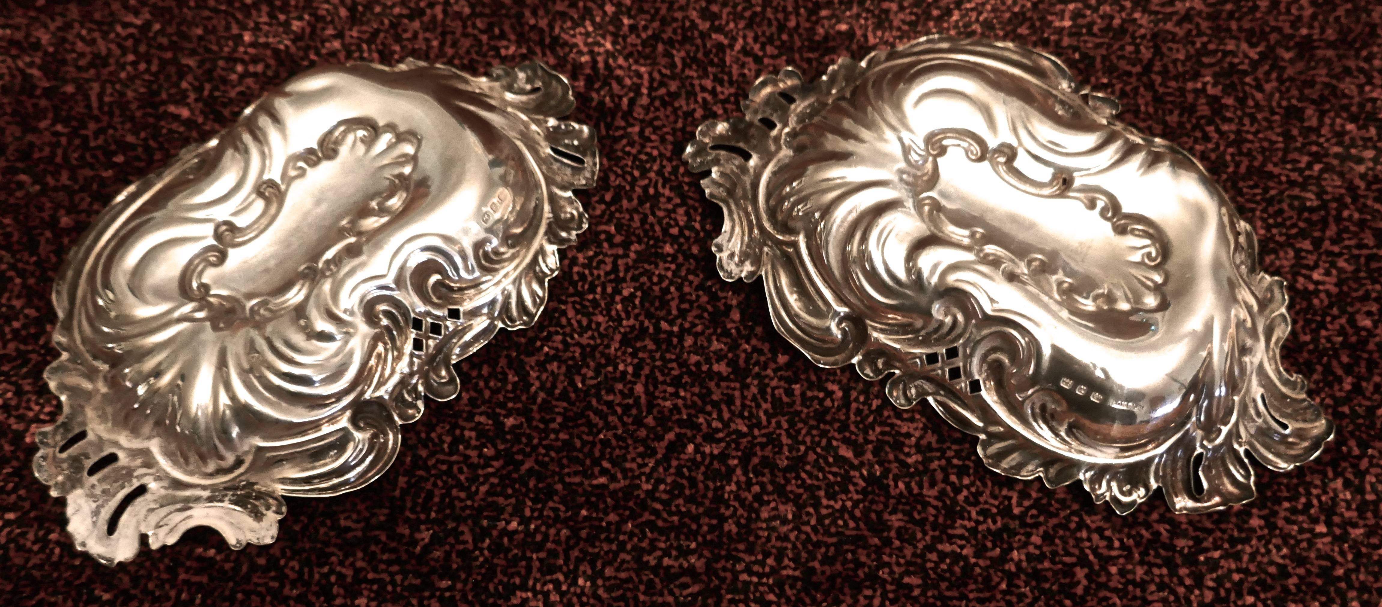 A pair of solid silver Art Nouveau sweet dishes by Mappin Brothers, 1897.

These are superb quality antique Victorian sterling silver dishes, they are in the Art Nouveau style with acanthus leaves swirling outward from the centre creating a pretty