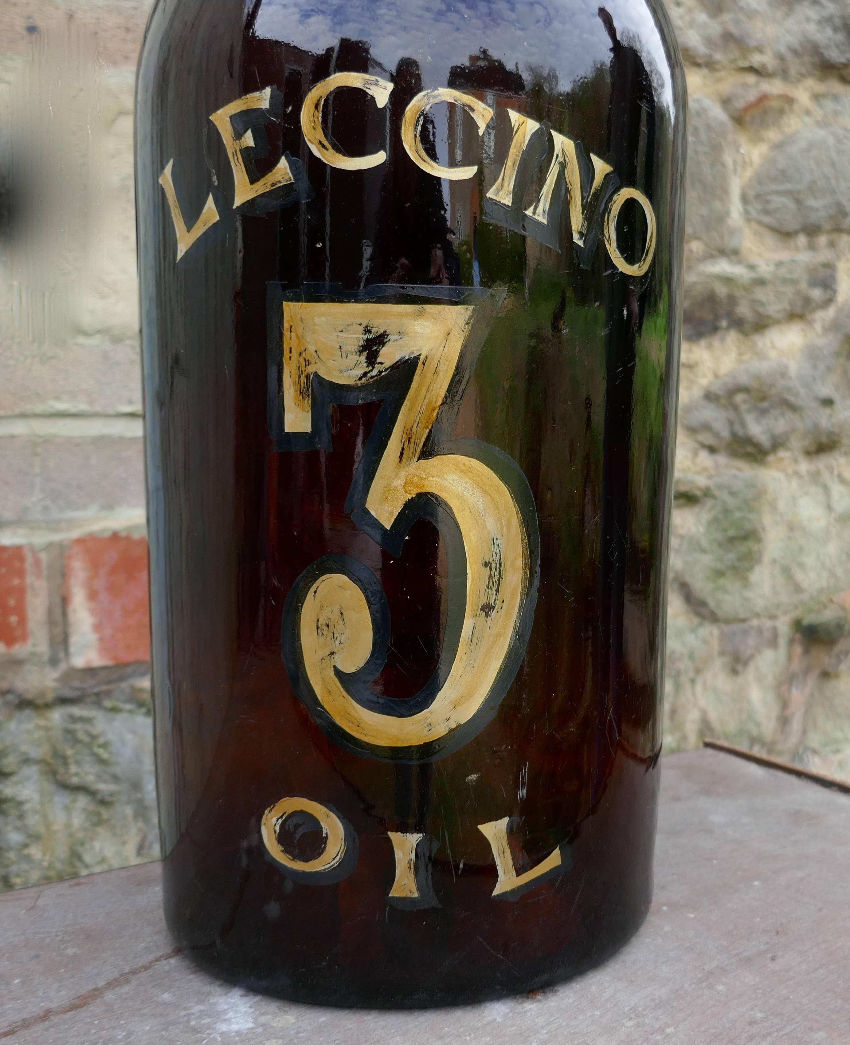 This is a super display piece, the bottle is made in brown glass, on the front it has the number 3 and LECCINO OIL in gold
The bottle is in god condition with only minor scuffing and they gold writing is in good condition
The bottle is 24” tall