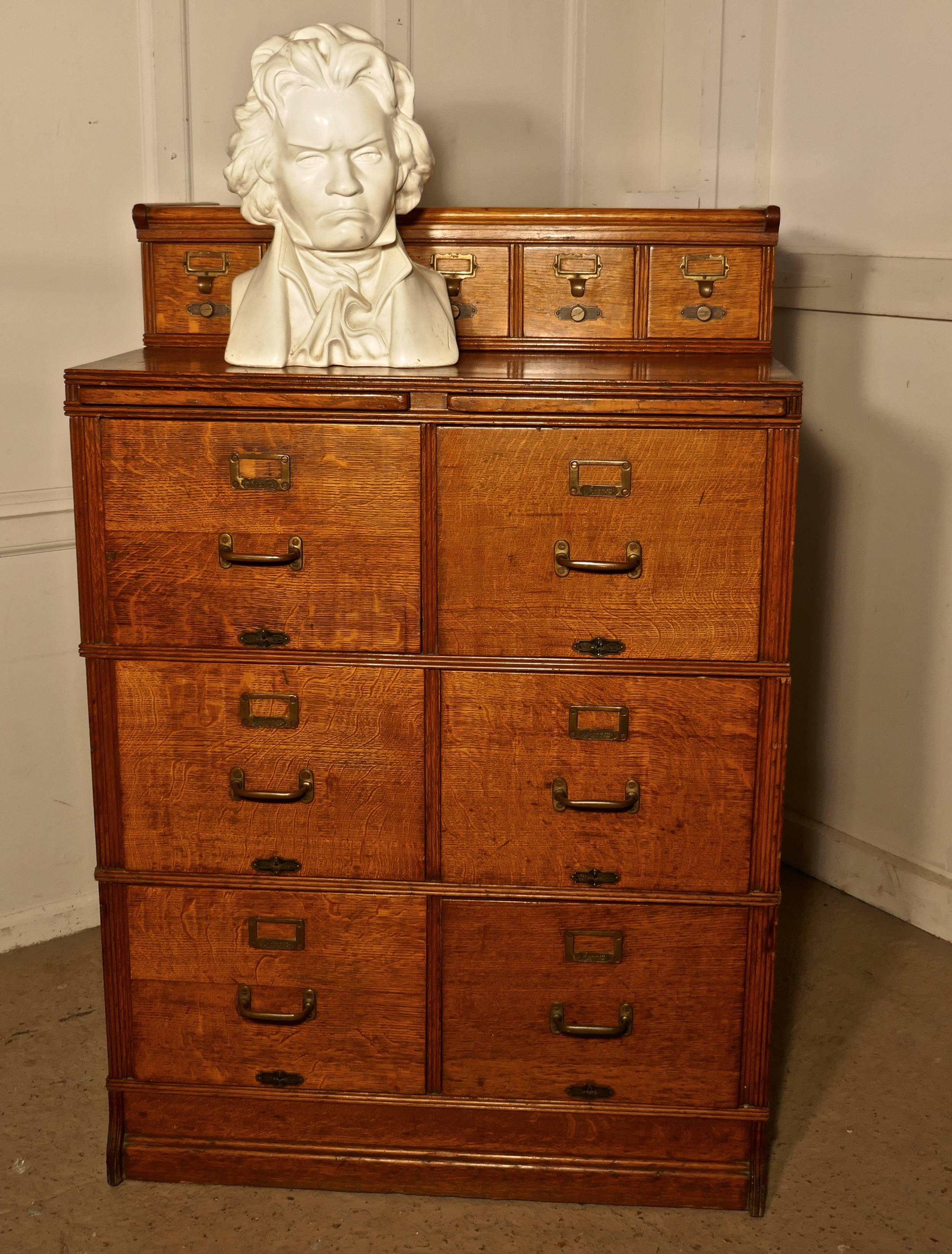 Large Edwardian 11-drawer oak filing cabinet by Shannon

This is an absolute must for every home office or study, it is sectional so no problem with access and all the sections clip together making it very sturdy.
The cabinet is made in golden