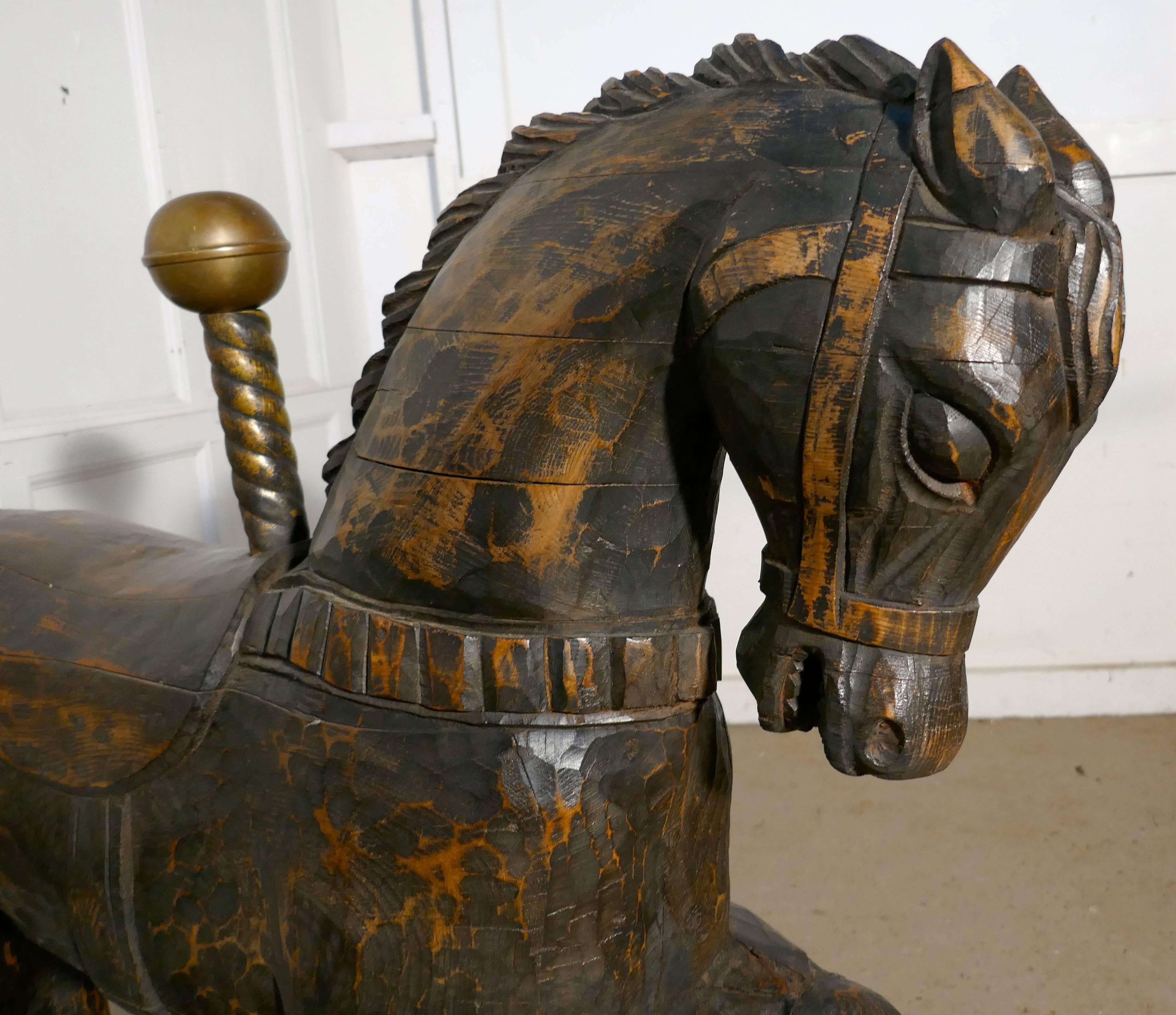 19th century wooden Spanish Carousel Galloper or fair ground horse

19th century fair ground Galloper, carved in wood and in fine detail you can see his mane, tail, eyes, saddle and even his shoes, the wood has a fantastic patina 

This