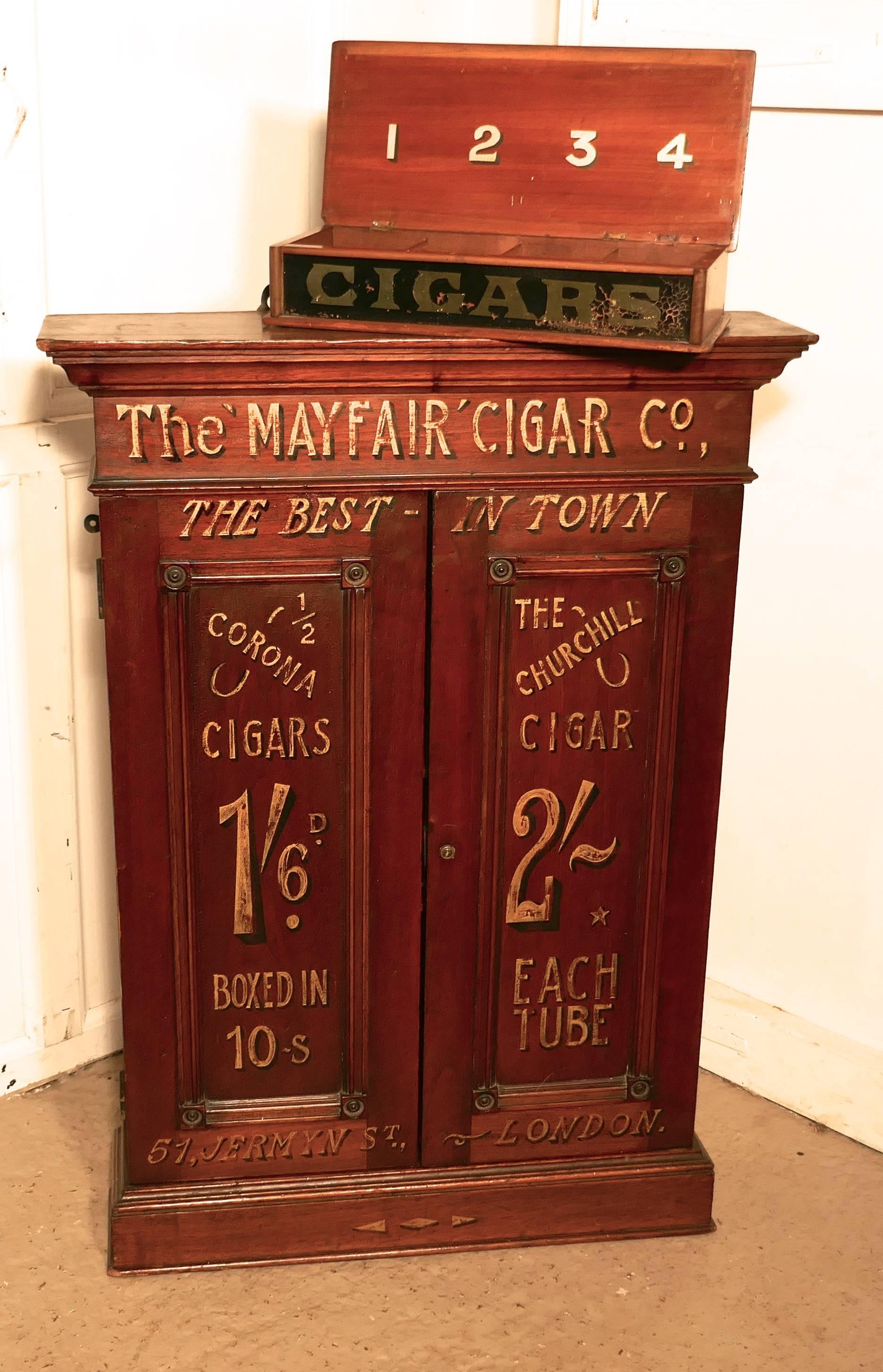 Victorian sign painted cigar store cupboard, shop display 

A lovely piece of 19th century shop display, this is a little mahogany cupboard is a wall hung piece from The Mayfiar Cigar Co, advertising their quality cigars, the writing dates from