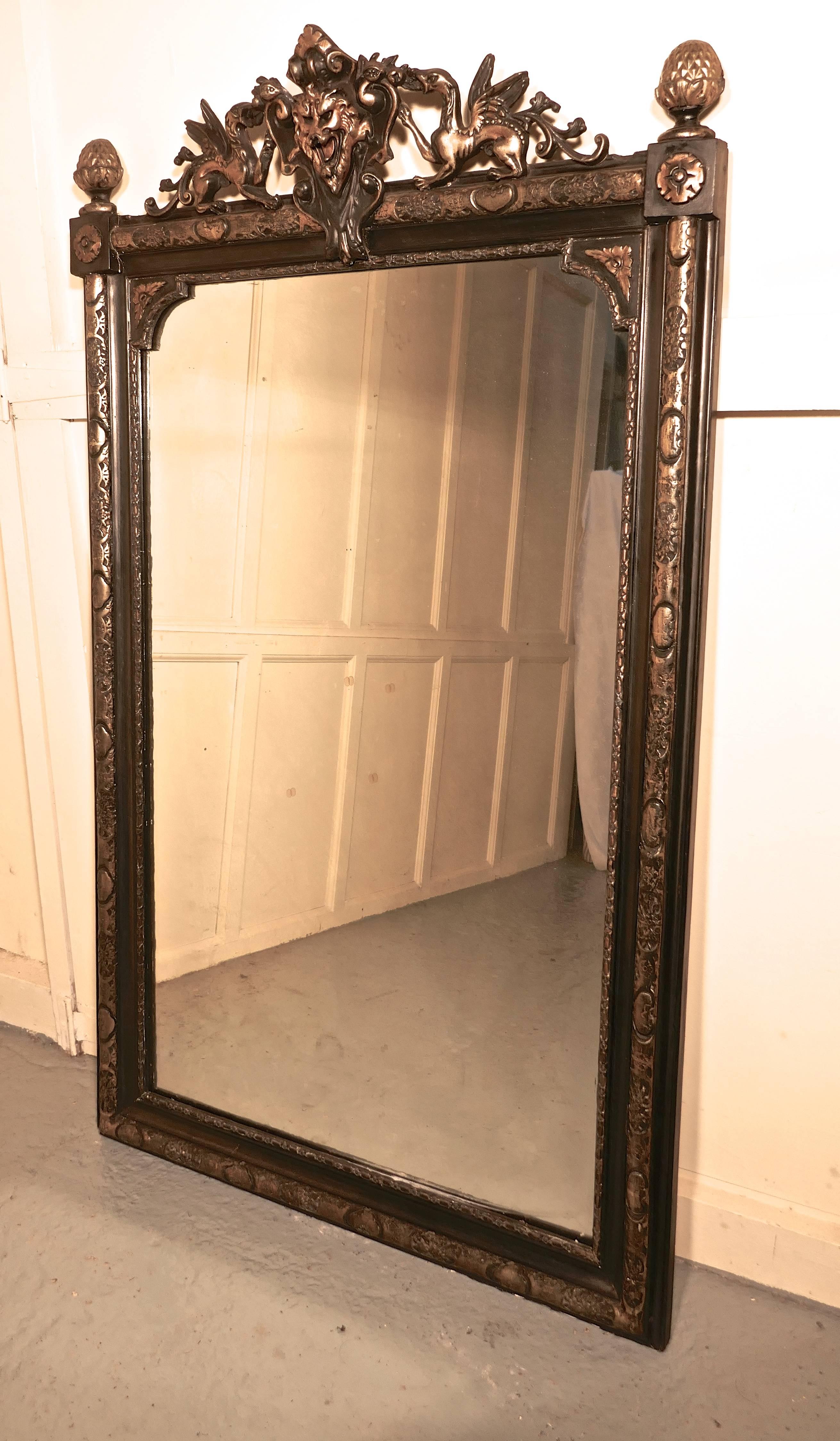 Adam Style Large French Ebonized and Gilt Mirror, Lyons Mask and Dragon Crest