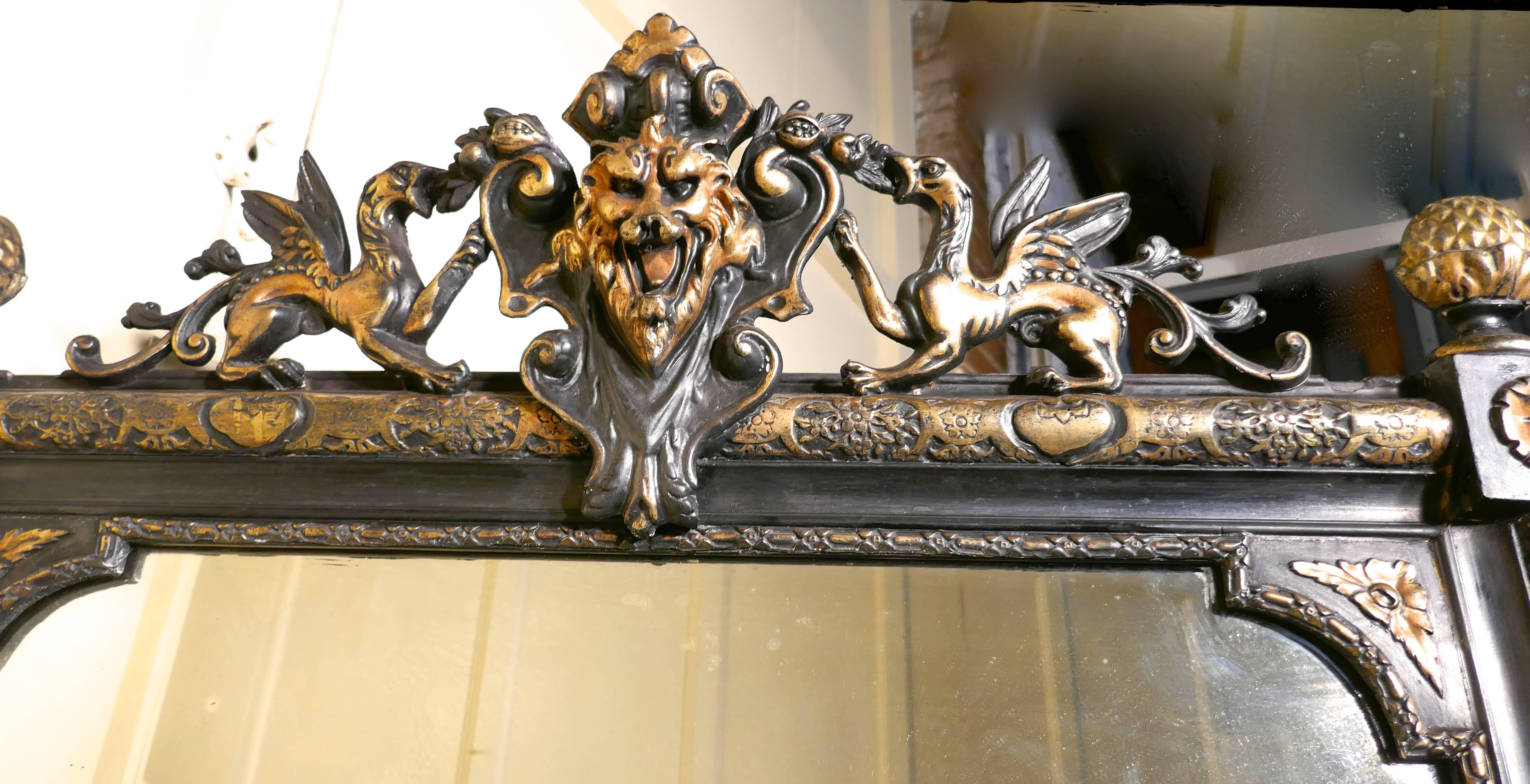 19th Century Large French Ebonized and Gilt Mirror, Lyons Mask and Dragon Crest