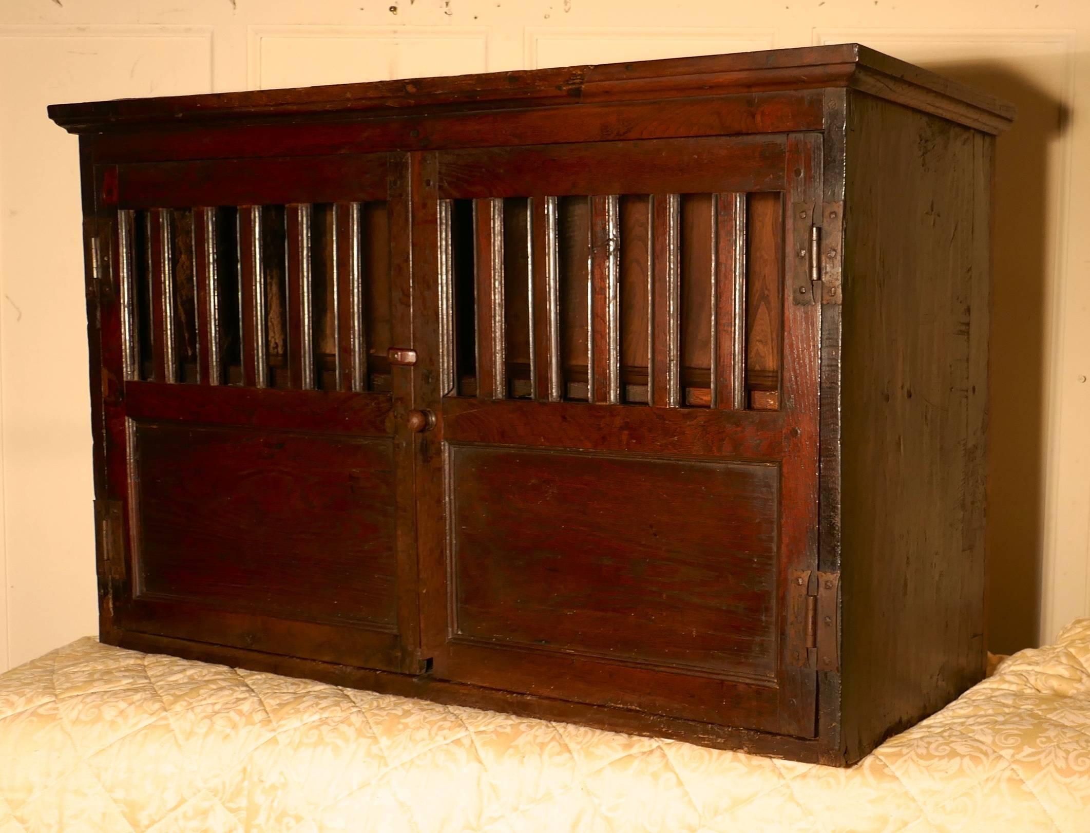 17th century antique oak food cupboard, bread hutch

This is a lovely Georgian country antique cupboard, the upper part of the doors are slatted to allow the free movement of air, inside there is a full length shelf, so all that is needed to keep