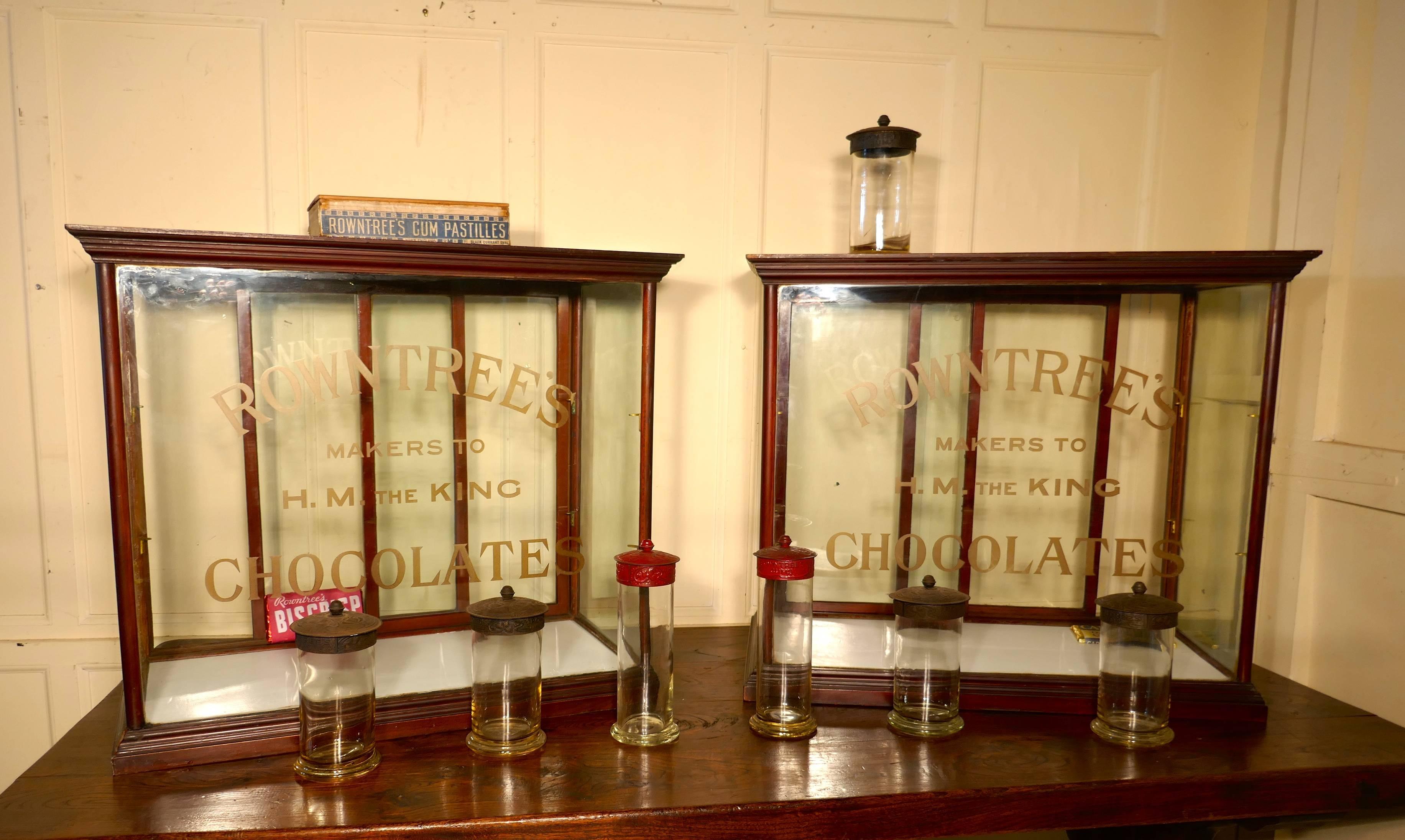 A Pair Sweet Shop Display Cabinets, Rowntree’s Chocolates

This is a pair of glazed advertising Shop Display Cabinets they are made mahogany, the lettering on the front of the cabinets is etched into the glass 
The words are 
ROWNTREE’S 
MAKERS TO