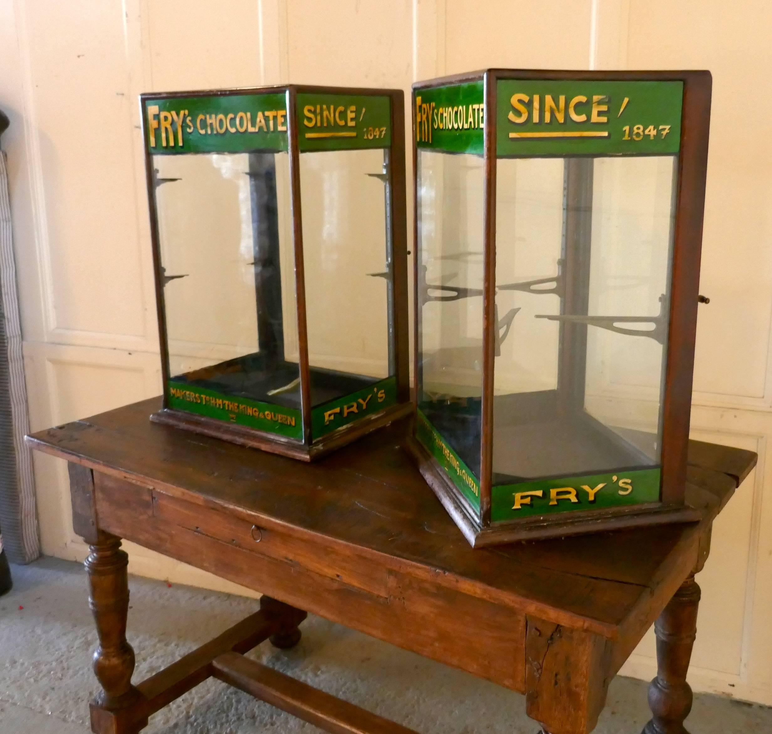 A pair of Edwardian Fry’s counter top shop display cabinets, sweet shop 

This pair of glazed shop display cabinets are made mahogany, they have advertising banners for Fry’s painted across the top and bottom at the front, these are in the