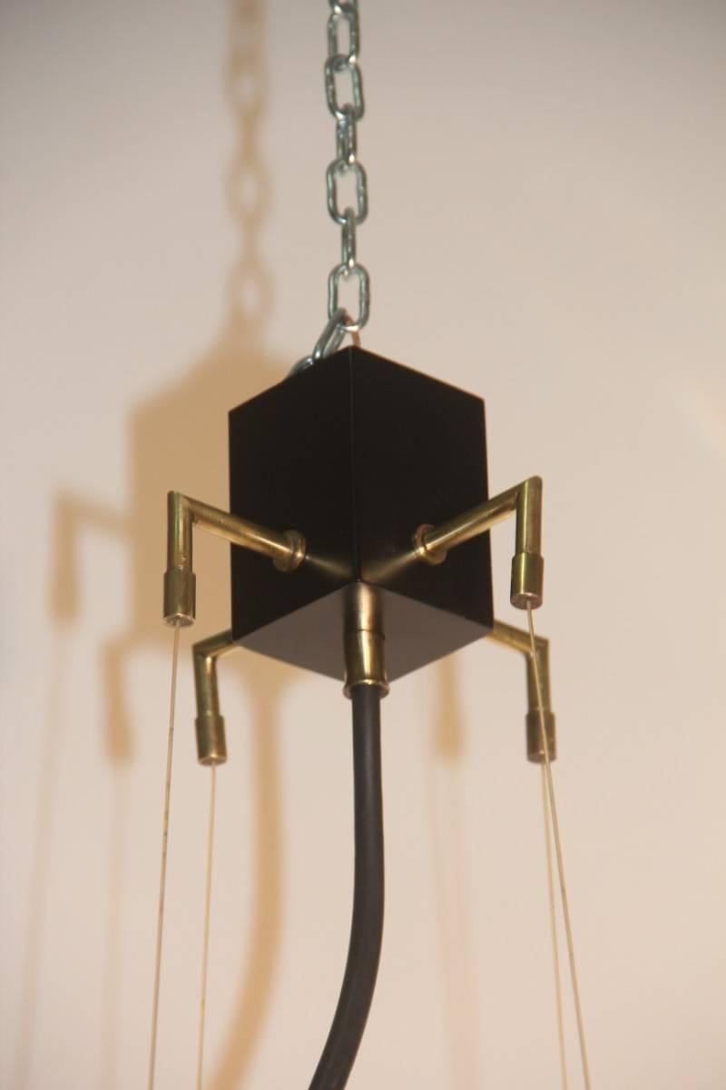 Ceiling lamp design Esperia Oscar Torlasco, 1960,the supporting structure is made of wood, black lacquered metal parts and parts in plexiglass, all combined exceptional results, as if it were an illuminated sculpture, beautiful fashion and very