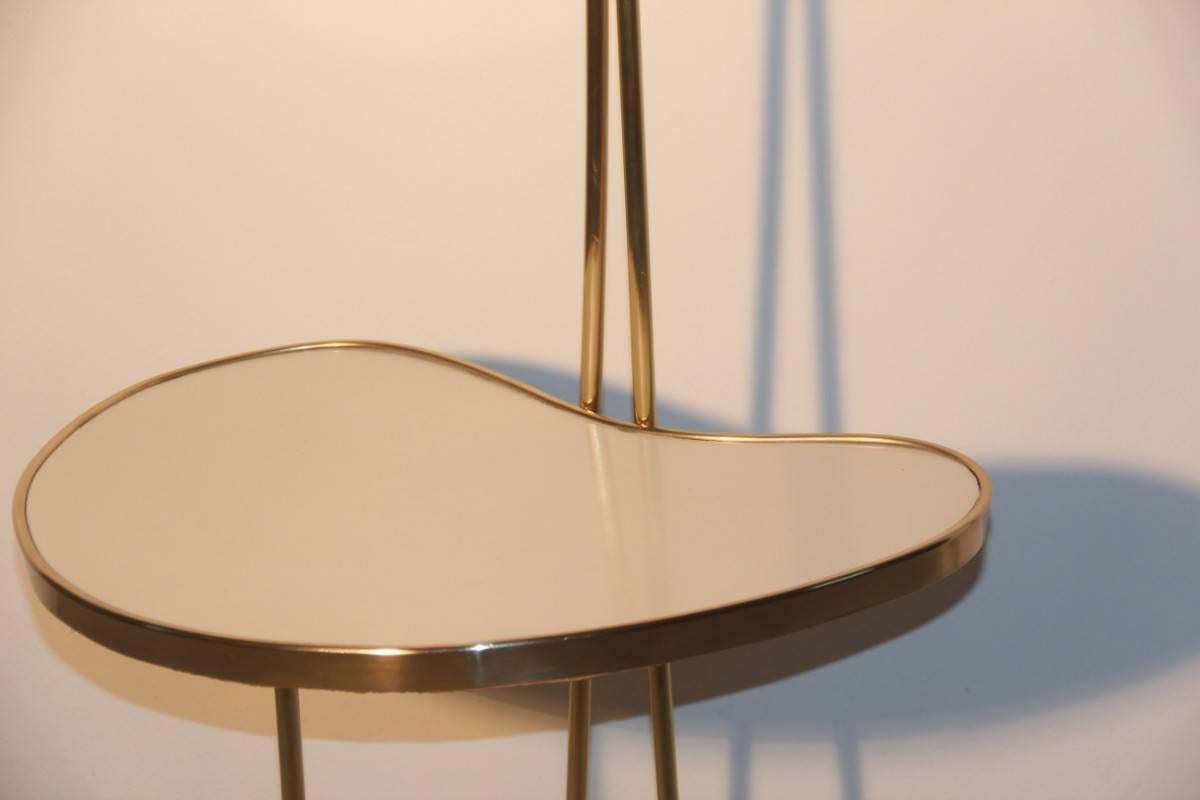 Floor lamp Mid-Century Italian design ,made of brass, colored cups in enameled metal, coffee table in white laminate, likely manufactory Stilnovo.