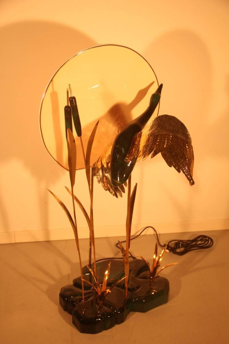 Elegant and particular floor with duck and sunset 1970, particular floor of 1970 in excellent condition, chic and elegant of its kind, Italian furniture of the 1970s or so.
